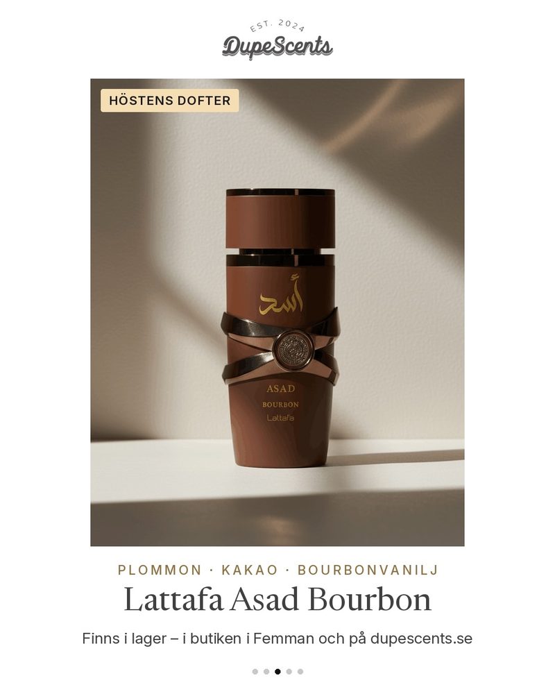 Produktbild för Dupescents: Lattafa Asad Bourbon på ljus stenbakgrund i solljus, med rubriken Höstens dofter.